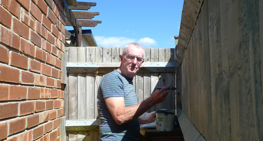 Saturday June 8th (2024) Painting the fence behind the brick shed width=