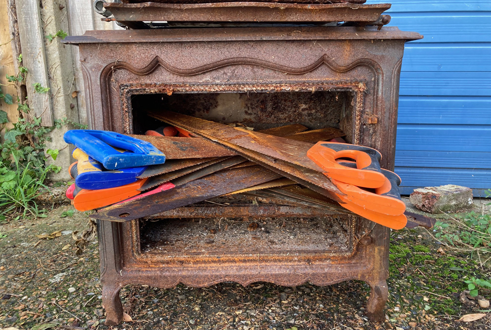 Thursday September 22nd (2022) Rusty saws in a rusted woodburner width=