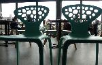 28: Two green chairs ...