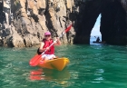 Jude and Lucy Kayak through the arch in St.Catherine