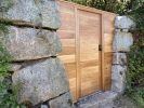 06: Wooden door in Cornish Granite